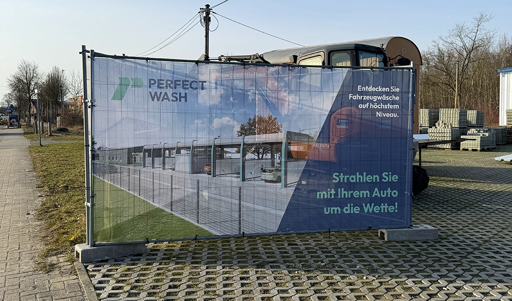 Gestaltung und Produktion von Bauzaunbannern in Soltau